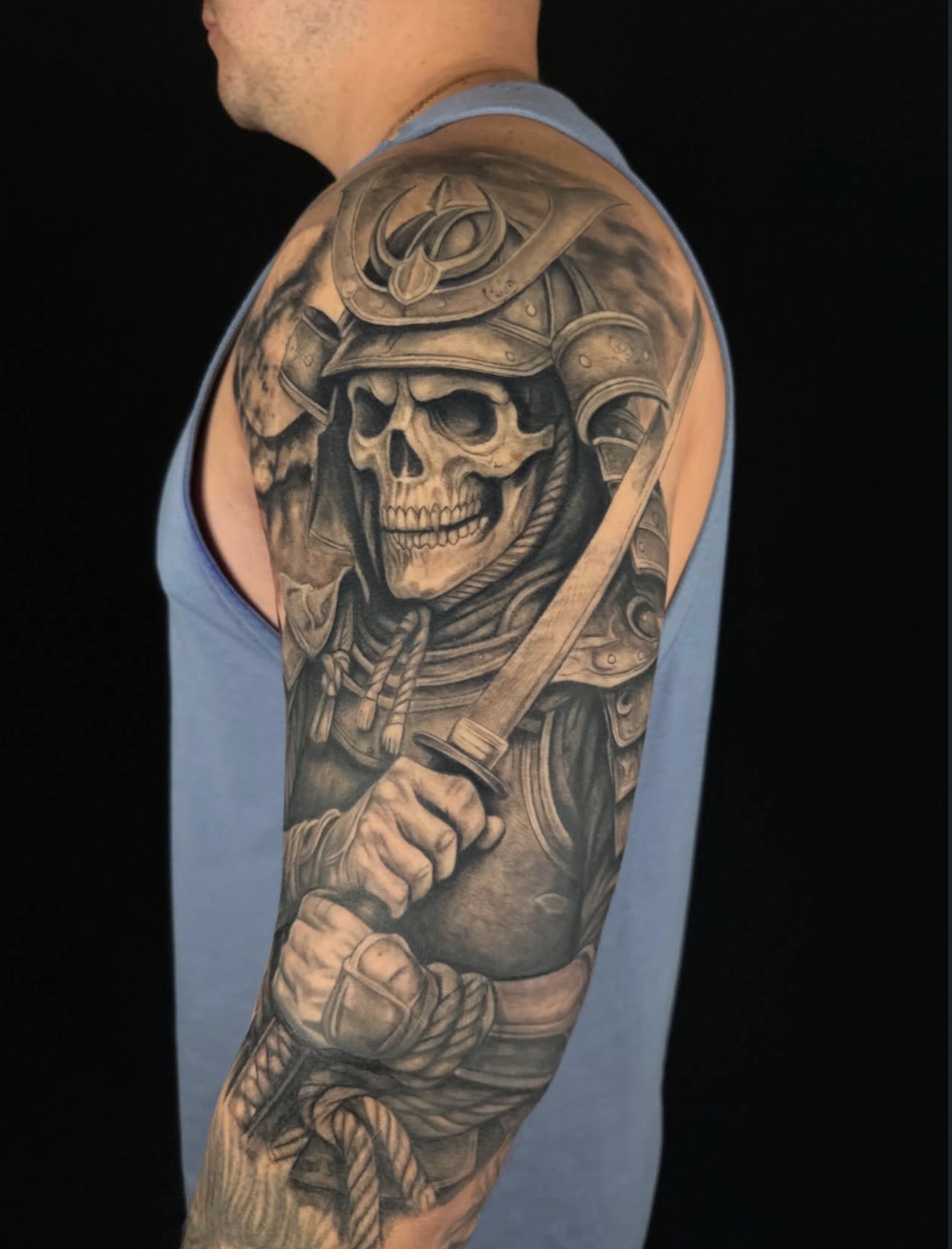 Black and grey samurai skull warrior sleeve tattoo by Sandra